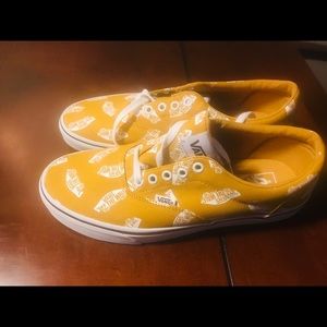 Yellow logo vans